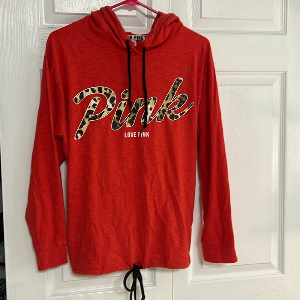Pink thin drawstring hoodie. Fits more like a medium